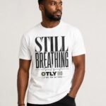 OTLY 869 Still Breathing Unisex Organic Cotton T-Shirt