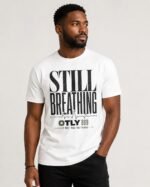 OTLY 869 Still Breathing Unisex Organic Cotton T-Shirt
