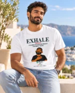 Man wearing the white Exhale Inner Strength unisex t-shirt outdoors