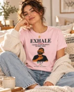 Woman wearing the Cotton Pink Exhale Inner Strength unisex t-shirt