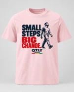 Cotton Pink Small Steps Big Change T-shirt with navy and red lettering and a walking figure, front view